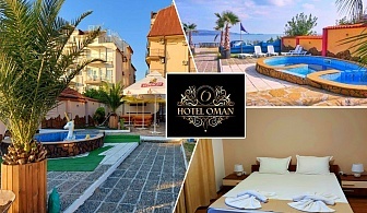  Нощувка на човек със закуска и вечеря с напитки + басейн от хотел Оман, Приморско 